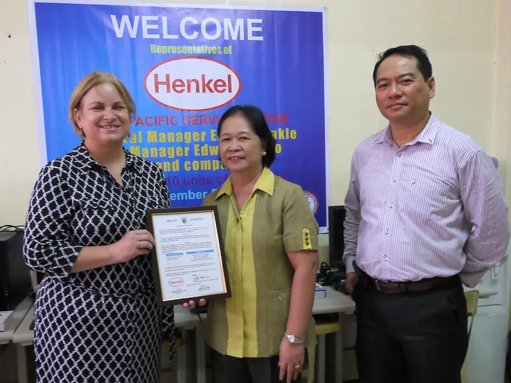 Elaine Kunkle and Edwin Revano personally delivered the computers, which will support the learning and development of students